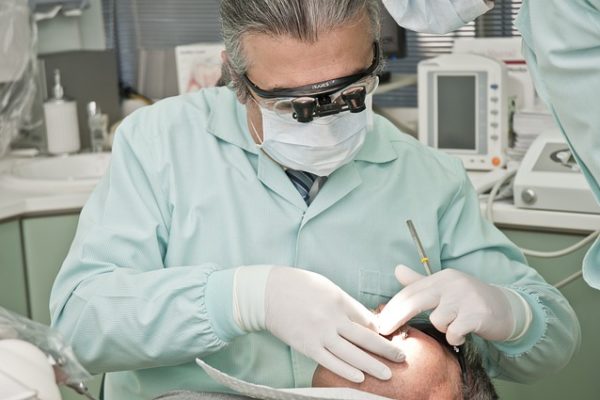 dentist doing a dental exam